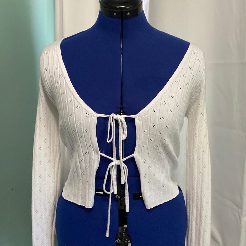 Long sleeve , cut cropped top